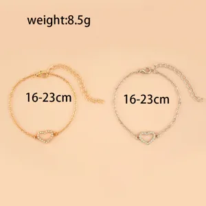 Élégant bracelet de chaîne de cœur en strass en or et argent, longueurs réglables.