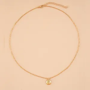 Gold-tone delicate chain necklace featuring a small round eight-pointed star crystal pendant for daily wear.