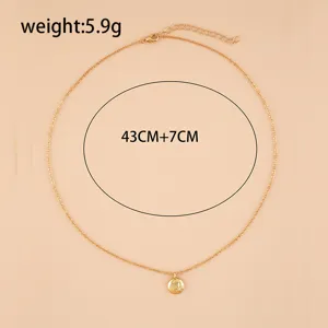 Gold-toned delicate clavicle necklace featuring a dainty star pendant and adjustable chain.