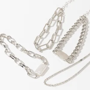Detailed view of the 4-piece silver chain bracelet set featuring freshwater pearls and chunky links.