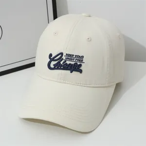 Beige baseball cap with Chicago embroidery, soft top casual sun hat for outdoor wear.