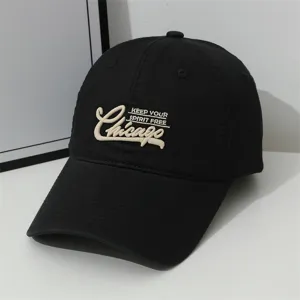 Black cotton baseball cap detail, embroidered Chicago cursive text, curved brim, casual hat.