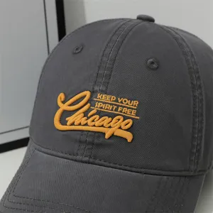 Dark grey baseball cap with yellow Chicago embroidery, soft top casual outdoor sun hat.