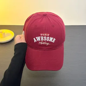 Stylish maroon baseball cap with white embroidered text, cotton casual sun hat for men and women.