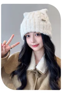 Detailed view of women's autumn winter knitted cat ear beanie hat cozy warm headwear
