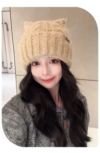 Cute cat ear knitted hat for women, thick warm wool pullover cap, stylish winter fashion accessory.