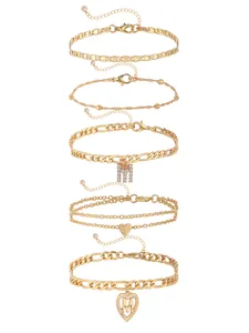 Detailed view of gold layered initial letter M anklet set, featuring delicate heart charms.