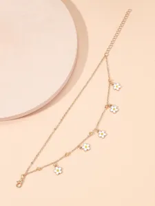 Gold-toned double layer anklet featuring cute white enamel daisy flower pendants.