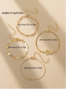 Gold-plated anklet set featuring heart, snake pendant, and link chains for women fashion style.