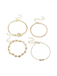 Set of four fashionable gold anklets featuring diverse chains, snake pendant, and secure clasps.