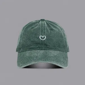 Washed green baseball cap with cute white heart embroidery, vintage style breathable summer hat.