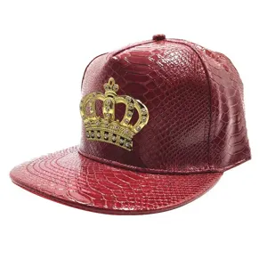 Detailed shot of the red snake-pattern PU leather flat brim hat with a gold crown badge.