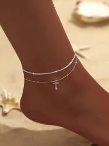 Mehrlagige Kreuz Fußkette für Damen glänzende Kette Strand Schmuck minimalistischer Stil.