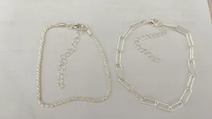Silbernes Fußkettchen Set mit Sternen und Büroklammer Ketten Design für Damen im Trend.