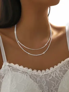 Elegant sparkling double layer silver chain necklace for women, chic fashion jewelry.