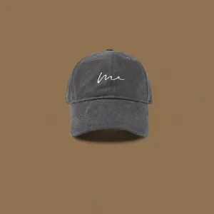 Dark grey baseball cap detail, embroidered white script letter, trendy casual sun hat.