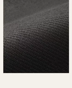 Close-up view of dark anti-slip diatomaceous earth mat showing fine textured surface details.