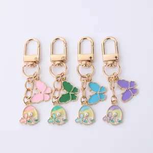 Colorful butterfly alloy enamel keychain charm detail view, perfect cute bag hanging accessory.