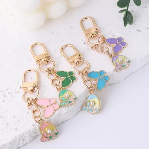 Charming enamel butterfly keychain pendant detailed view, colorful alloy bag charm accessory.
