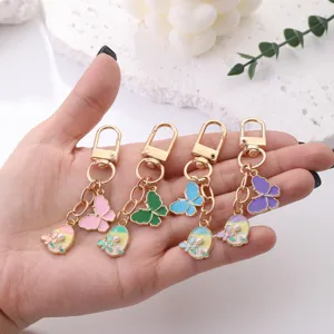 Colorful butterfly metal keychains set, alloy oil drop bag charms, DIY creative gift items.