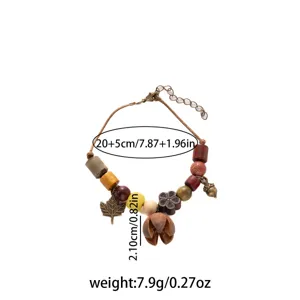 Vintage ethnic style handmade wooden bead bracelet with cute acorn and leaf charms for women.