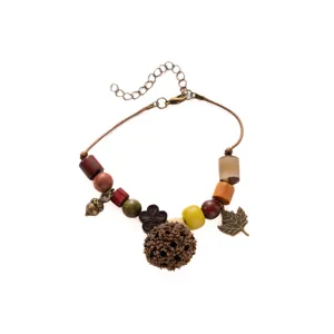 Boho vintage handmade acorn wooden bead bracelet detail, perfect for autumn natural style.