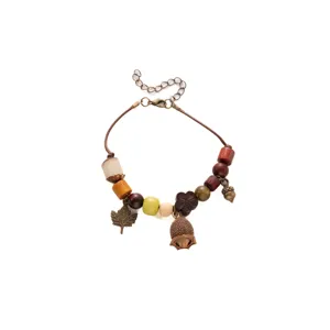 Vintage ethnic style handmade wooden bead bracelet with cute maple leaf and acorn charms.