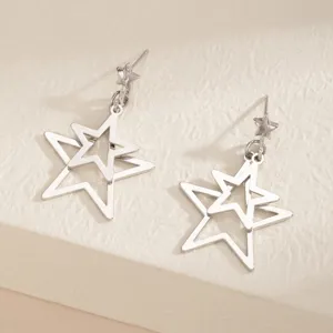 Silver double layer hollow star pendant stud earrings, minimalist chic detail view.