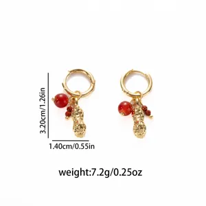 Gold peanut pendant earrings with red bead charms, detailed size and weight spec view.