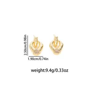 Gold textured teardrop earrings with crystal details, vintage chic geometric drop earrings.