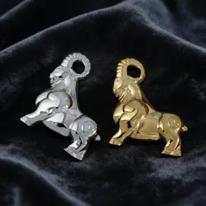 Detailed view of the geometric ram metal pendant showing metallic texture and form.