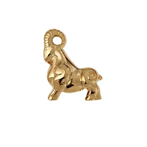 Detailed shot of a gold-tone 3D geometric ram pendant, polished metal texture closeup.