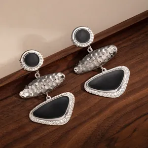 Vintage asymmetric geometric metal earrings with black drop oil design, elegant long drop style.