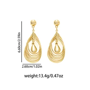 Exquisite geometric hollow wound teardrop pendant earrings, unique metallic statement jewelry.