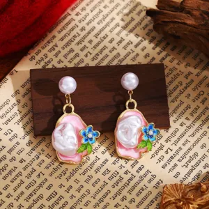 French retro Monet garden enamel flower Baroque pearl dangle earrings fine detail view.