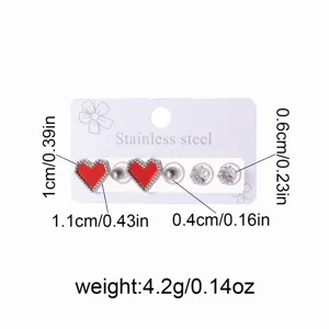 Detailed view of stainless steel heart crystal and bead stud earrings set, compact size.