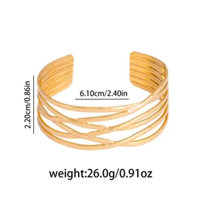 Gold geometric open cuff bracelet, wide multi-layer layered statement wrist jewelry.