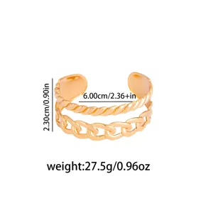 Detail view of the wide open cuff bracelet with double layered chain and twisted rope design.
