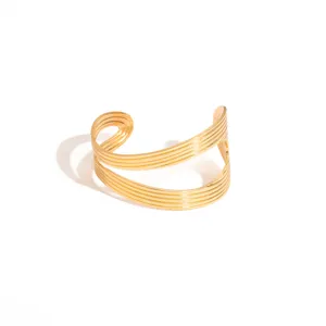 Gold geometric open cuff bracelet, irregular hollow design, retro metal heavy style jewelry.