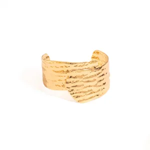 Chic wide gold-tone metal cuff bracelet with unique hammered texture and geometric open design.