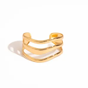 Gold multi-strand wavy open cuff bracelet, chic geometric hollow metal jewelry for women.