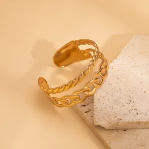 Gold double-strand open cuff bracelet, chunky chain and twisted rope metal design.