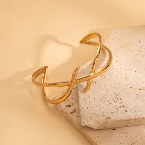 European and American retro irregular geometric hollow gold open bangle bracelet detail shot.