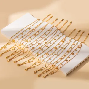 Gold stainless steel charm bracelets set with rhinestone geometric flower pendants for women.