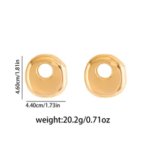 Gold geometric irregular metal stud earrings detail view showing size and weight specs.