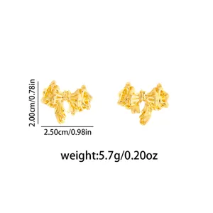 Gold metallic bow earrings detail, stylish niche design, compact size 2x2.5cm, weight 5.7g.