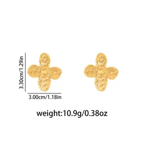 Gold stainless steel four leaf clover flower stud earrings with unique textured design style.