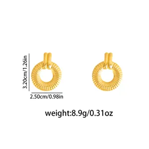 Retro gold textured circular earrings, stylish geometric stainless steel stud jewelry for women.