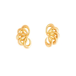 European retro geometric hollow leaf earrings, minimalist metal design detail shot.