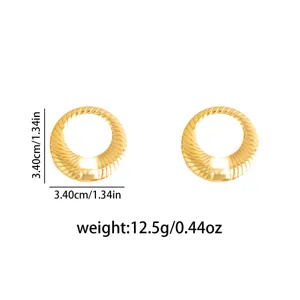 Retro gold textured circular earrings, stylish geometric metal design, lightweight luxury style.